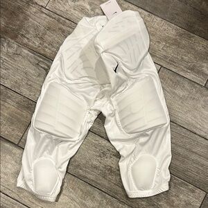 Nike dri-fit padded football pants XL.
